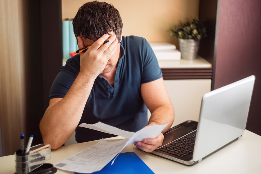 7 Signs Your Debt is Spiraling Out of Control and How to Fix It image
